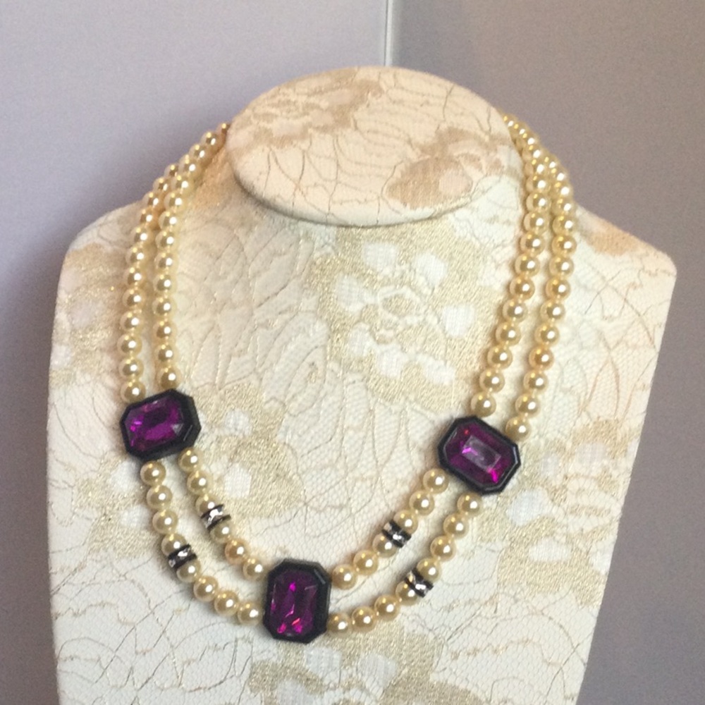 Necklace made with faux pearls and purple beads